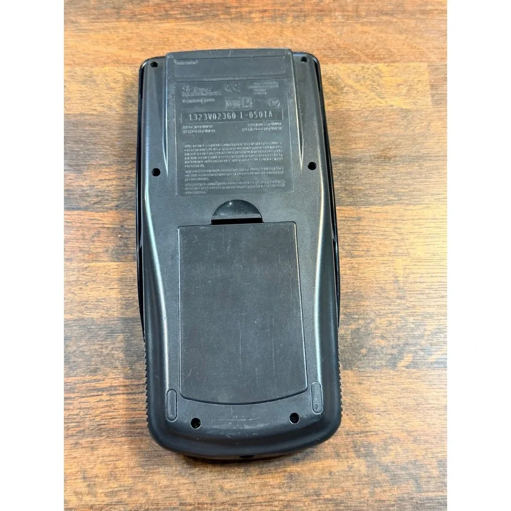 Texas Instruments TI-83 Plus graphing calculator with cover.  1999. Tested